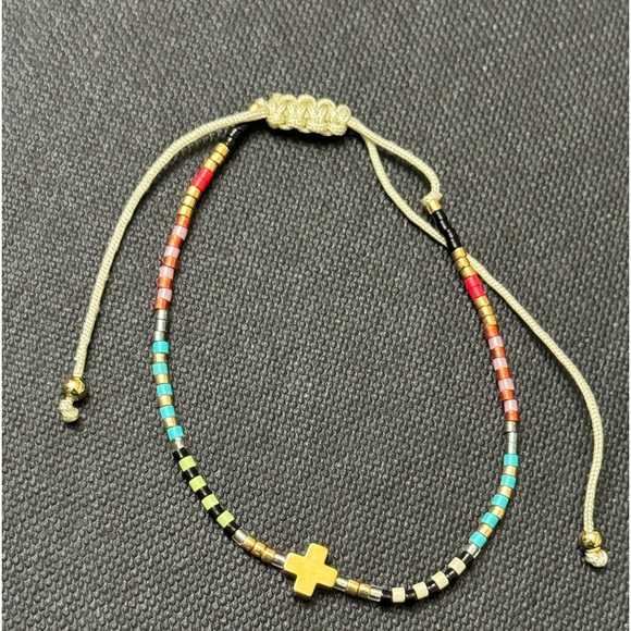 Micro-bead pull string bracelet with cross - Picture 3 of 3